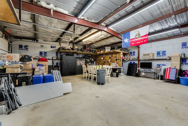 5709 E County Rd 97, Midland, TX 79706 - garage with a workshop area