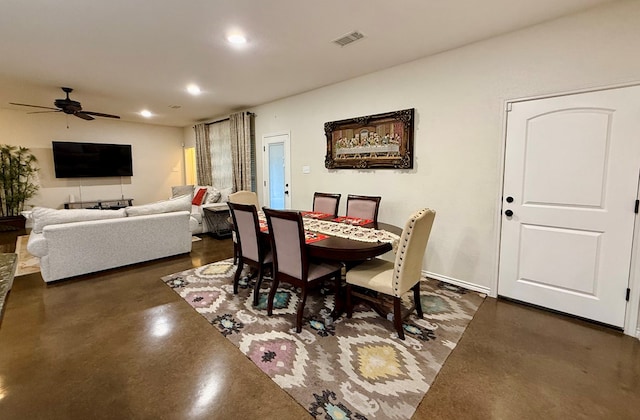 dining space with ceiling fan