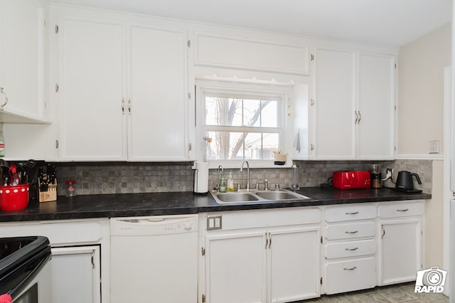 kitchen featuring dishwasher, tasteful backsplash, a sink, and white cabinetry