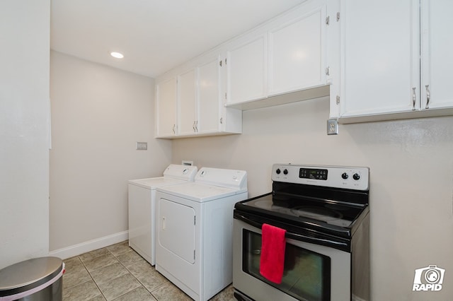 clothes washing area with light tile patterned flooring, washing machine and dryer, baseboards, and recessed lighting