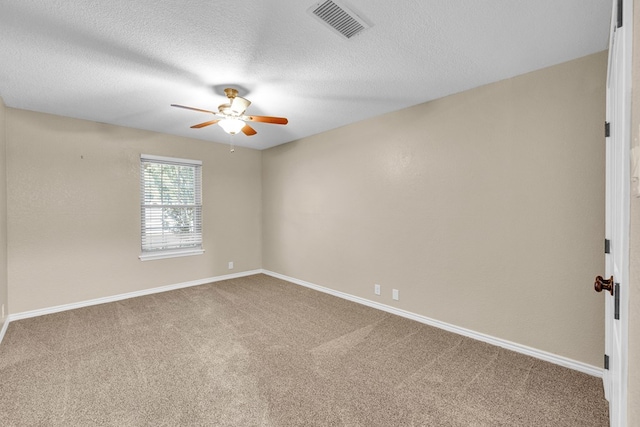 10606 E County Rd 104, Midland, TX 79706 - carpeted spare room with a ceiling fan and a textured ceiling