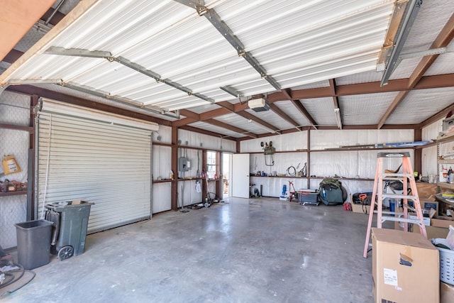 10606 E County Rd 104, Midland, TX 79706 - garage featuring a garage door opener