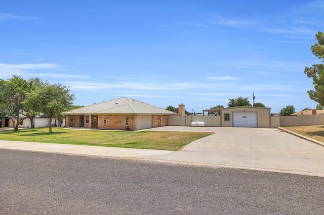 10606 E County Rd 104, Midland, TX 79706 - single story home with driveway and a garage