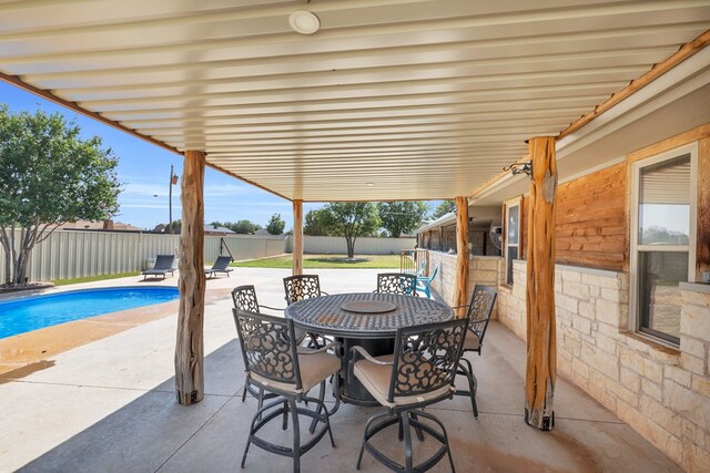10606 E County Rd 104, Midland, TX 79706 - fenced backyard featuring a patio area and outdoor dining space