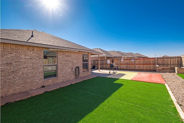 view of yard with a patio area