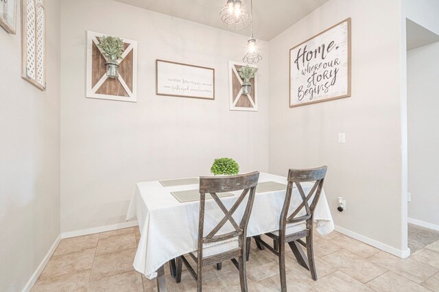 view of tiled dining space