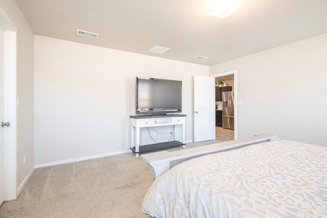 bedroom with light carpet and stainless steel fridge with ice dispenser