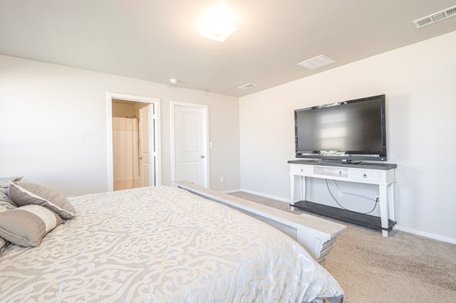 bedroom with light carpet