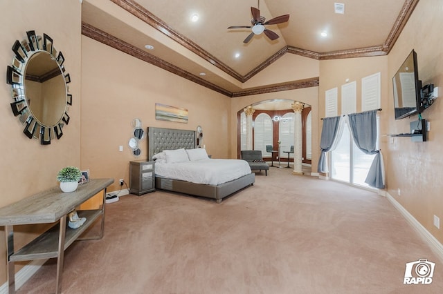 540 SE Loop 338, Odessa, TX 79766 - bedroom featuring arched walkways, crown molding, carpet, vaulted ceiling, and decorative columns