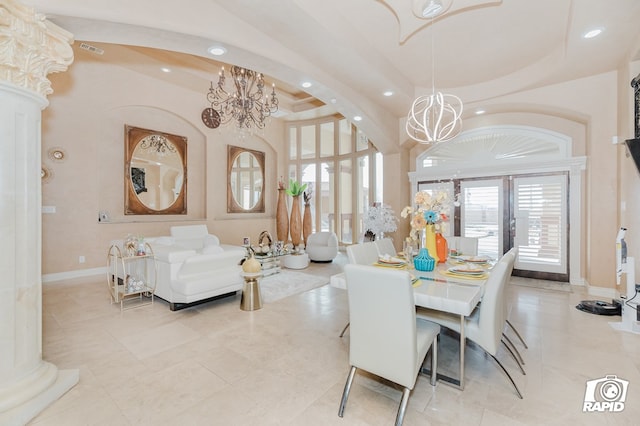 540 SE Loop 338, Odessa, TX 79766 - dining space with a chandelier, plenty of natural light, recessed lighting, a tray ceiling, and decorative columns