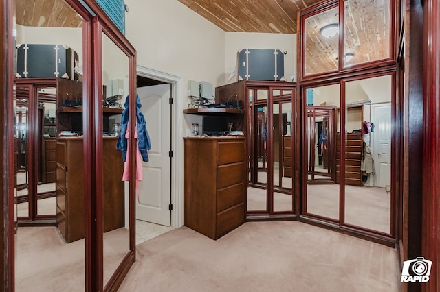 540 SE Loop 338, Odessa, TX 79766 - hall with carpet flooring, wood ceiling, and vaulted ceiling