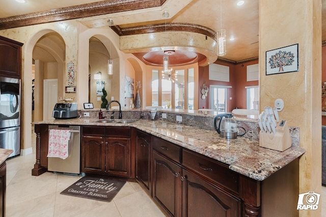 540 SE Loop 338, Odessa, TX 79766 - kitchen with dishwasher, crown molding, arched walkways, light tile patterned floors, and a chandelier