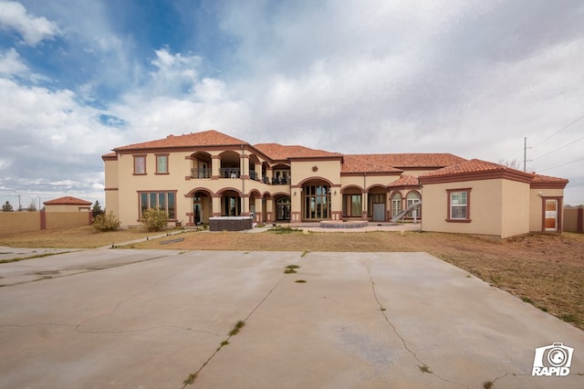 540 SE Loop 338, Odessa, TX 79766 - mediterranean / spanish house with stucco siding and a balcony