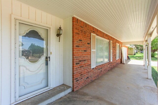 2608 E 24th St, Big Spring, TX 79720 - entrance to property featuring brick siding and covered porch