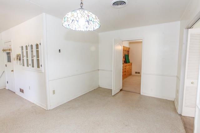 2608 E 24th St, Big Spring, TX 79720 - unfurnished dining area featuring baseboards and a chandelier