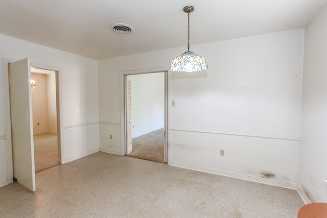 2608 E 24th St, Big Spring, TX 79720 - spare room featuring a chandelier