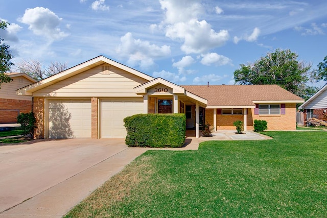 single story home featuring a front yard and a garage