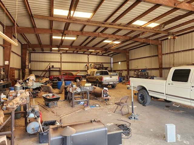 garage featuring a carport