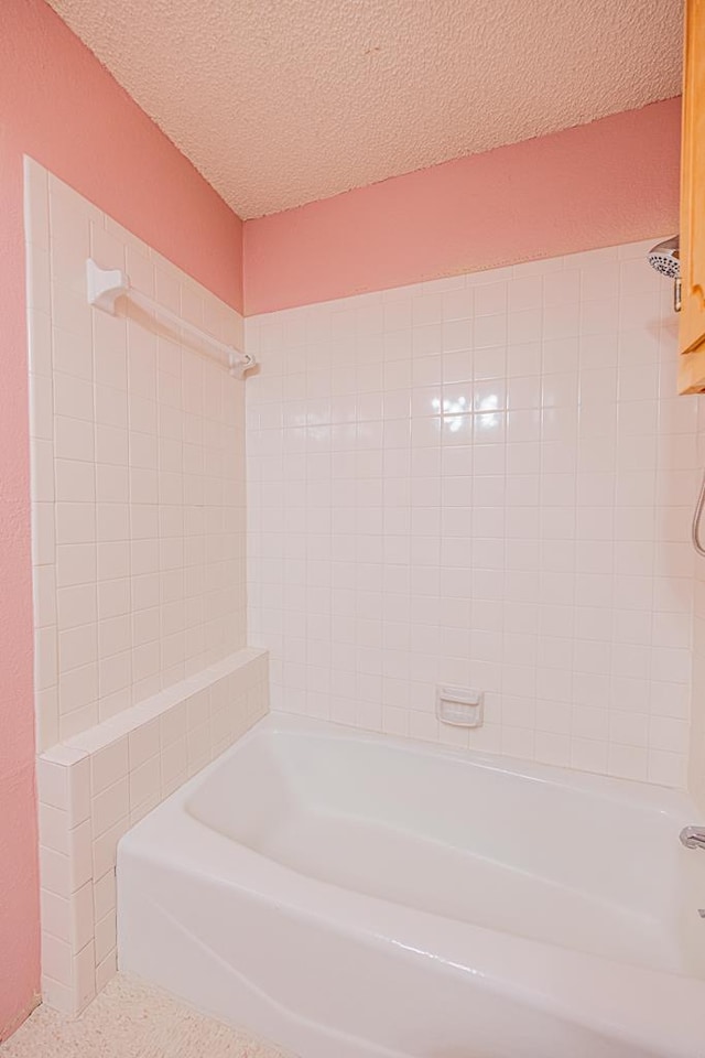 309 Edgewood Dr, Midland, TX 79703 - full bath with tub / shower combination and a textured ceiling