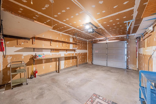 309 Edgewood Dr, Midland, TX 79703 - garage featuring a garage door opener