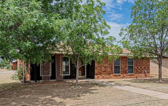 309 Edgewood Dr, Midland, TX 79703 - view of front of home with brick siding