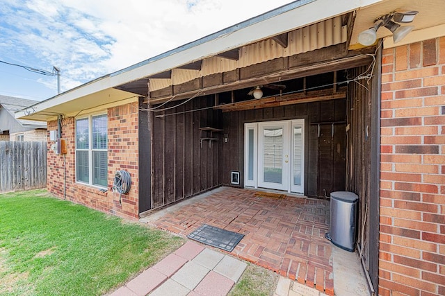 309 Edgewood Dr, Midland, TX 79703 - view of exterior entry featuring brick siding