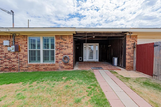 309 Edgewood Dr, Midland, TX 79703 - property entrance with brick siding