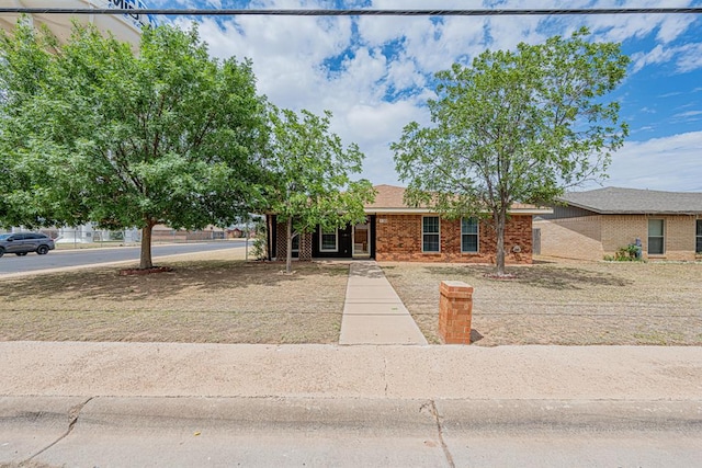 309 Edgewood Dr, Midland, TX 79703 - view of front of home with brick siding