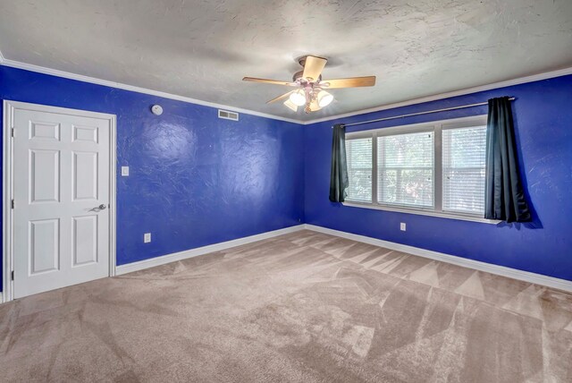 1600 W Kansas, Midland, TX 79701 - carpeted spare room with a ceiling fan, baseboards, and ornamental molding
