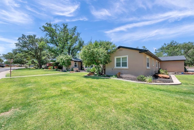 1600 W Kansas, Midland, TX 79701 - view of front of home featuring stucco siding and a front yard