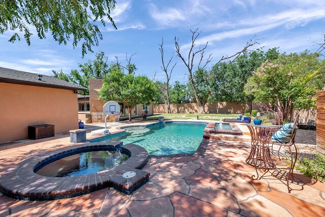 1600 W Kansas, Midland, TX 79701 - view of pool with a pool with connected hot tub, a patio, and a fenced backyard