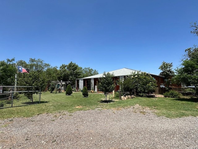 exterior space with a front lawn