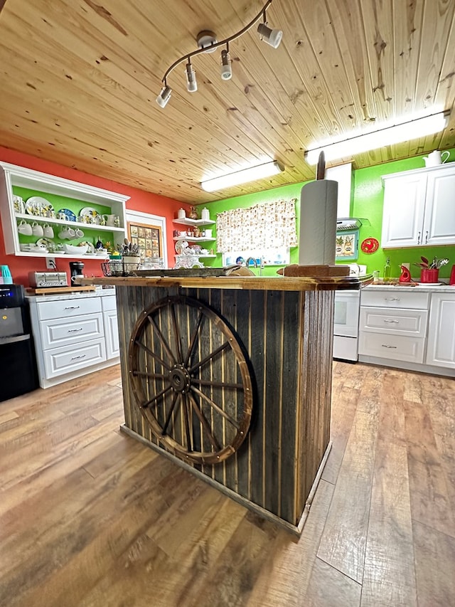 kitchen with light hardwood / wood-style flooring, white cabinetry, wooden ceiling, and white range oven