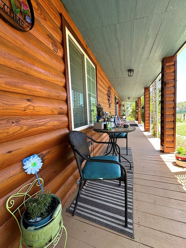 wooden deck with a porch