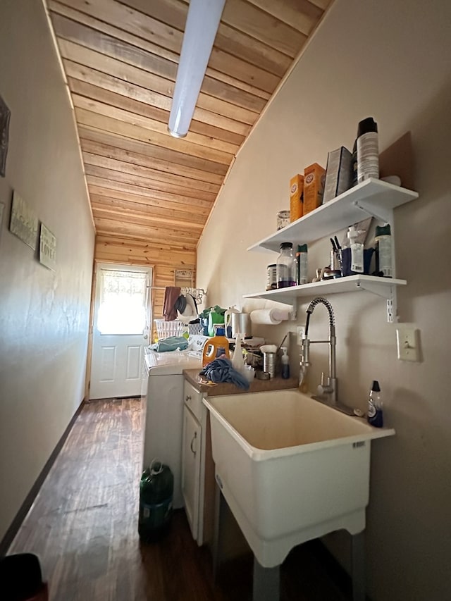 kitchen featuring hardwood / wood-style flooring, wood ceiling, sink, and vaulted ceiling