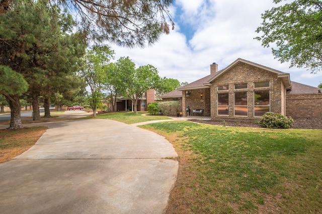 exterior space featuring a lawn