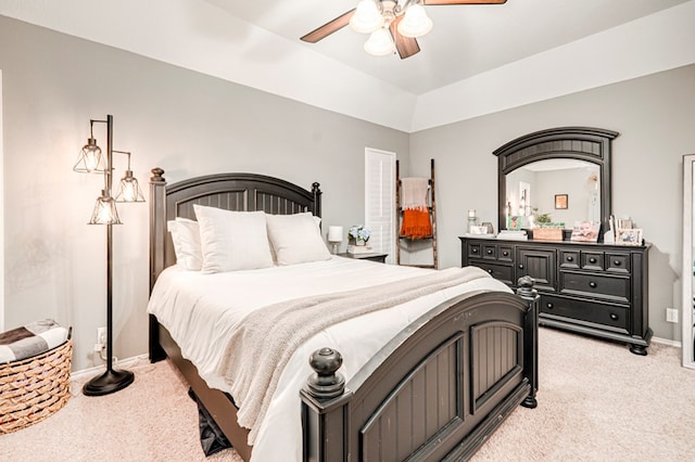 bedroom featuring baseboards, a ceiling fan, and light carpet
