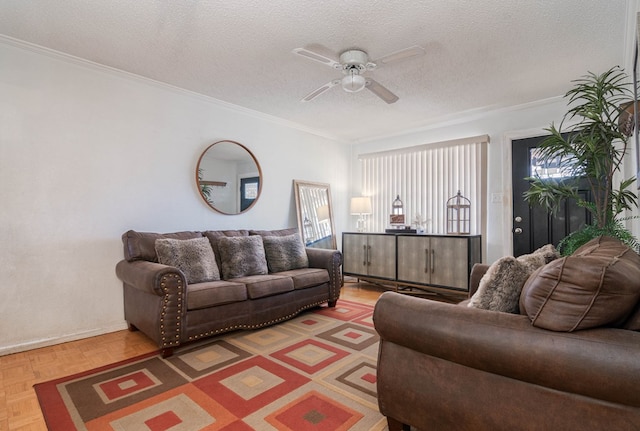 living area featuring crown molding, a ceiling fan, and a textured ceiling