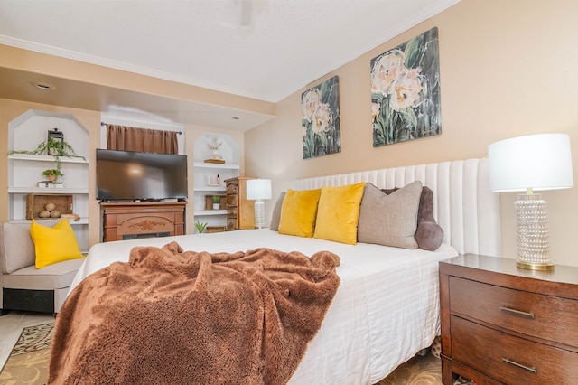 bedroom with crown molding