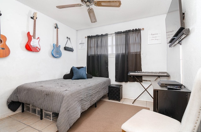 tiled bedroom with ceiling fan