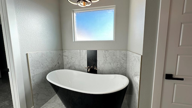 bathroom with a tub