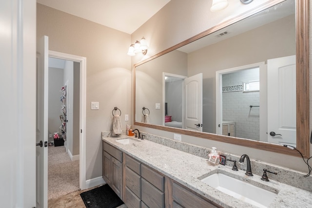 7604 Keyhaven, Odessa, TX 79765 - bathroom with double vanity and a tile shower