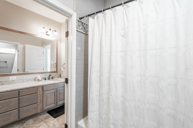 7604 Keyhaven, Odessa, TX 79765 - bathroom featuring vanity and shower / bath combo with shower curtain