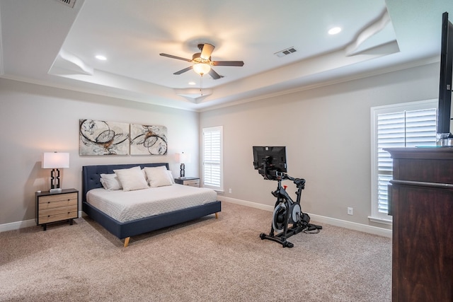 7604 Keyhaven, Odessa, TX 79765 - carpeted bedroom with a tray ceiling, recessed lighting, and a ceiling fan
