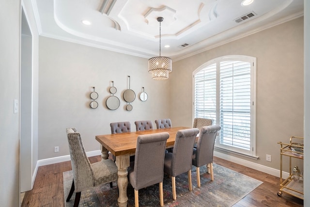 7604 Keyhaven, Odessa, TX 79765 - dining area with crown molding, wood finished floors, recessed lighting, and a tray ceiling