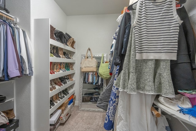 7604 Keyhaven, Odessa, TX 79765 - walk in closet featuring carpet floors