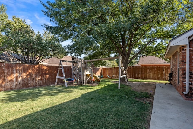 view of yard featuring a playground