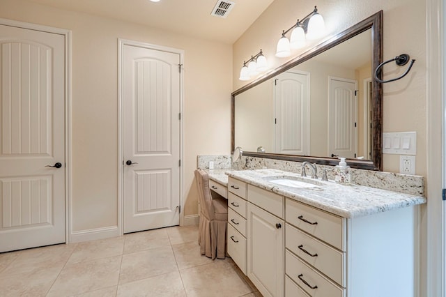 bathroom featuring vanity and tile patterned floors