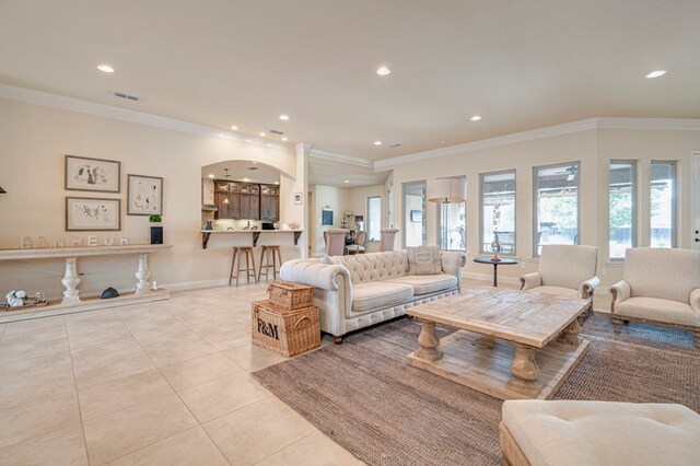 bedroom featuring dark wood-style floors, a tray ceiling, multiple windows, and baseboards