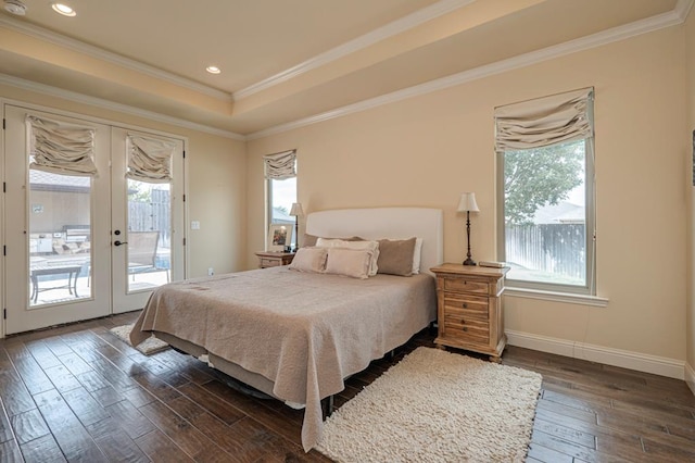 bedroom with access to exterior, crown molding, french doors, and dark hardwood / wood-style floors